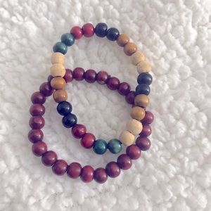 Our bracelets are elastic, portable to any hand size.